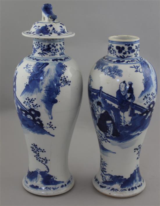 Two Chinese blue and white baluster vases and a cover, late 19th century, 28cm